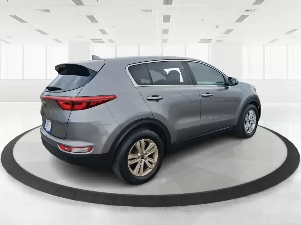 2018 Kia Sportage LX (KNDPM3AC0J7) with an Theta II 2.4L I-4 gasoline direct injection engine, 6A transmission, located at 1099 N County Rd 25A , Troy, OH, 45373, (937) 908-9800, 40.057079, -84.212883 - Weekend road trips to the Miami County Fair, daily commutes down I75, or quick errands between Downtown Troy and the shops near West Main Street-this 2018 Kia Sportage LX is the kind of compact SUV that fits real life. With its versatile crossover layout, confident road manners, and smart cargo spac - Photo#2