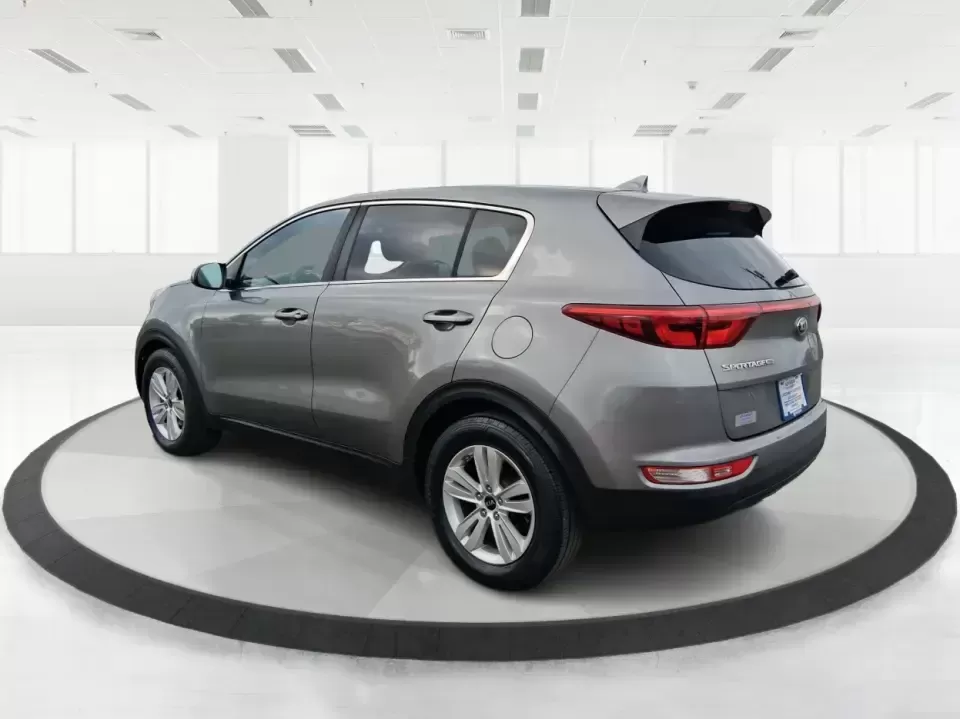 2018 Kia Sportage LX (KNDPM3AC0J7) with an Theta II 2.4L I-4 gasoline direct injection engine, 6A transmission, located at 1099 N County Rd 25A , Troy, OH, 45373, (937) 908-9800, 40.057079, -84.212883 - Weekend road trips to the Miami County Fair, daily commutes down I75, or quick errands between Downtown Troy and the shops near West Main Street-this 2018 Kia Sportage LX is the kind of compact SUV that fits real life. With its versatile crossover layout, confident road manners, and smart cargo spac - Photo#4