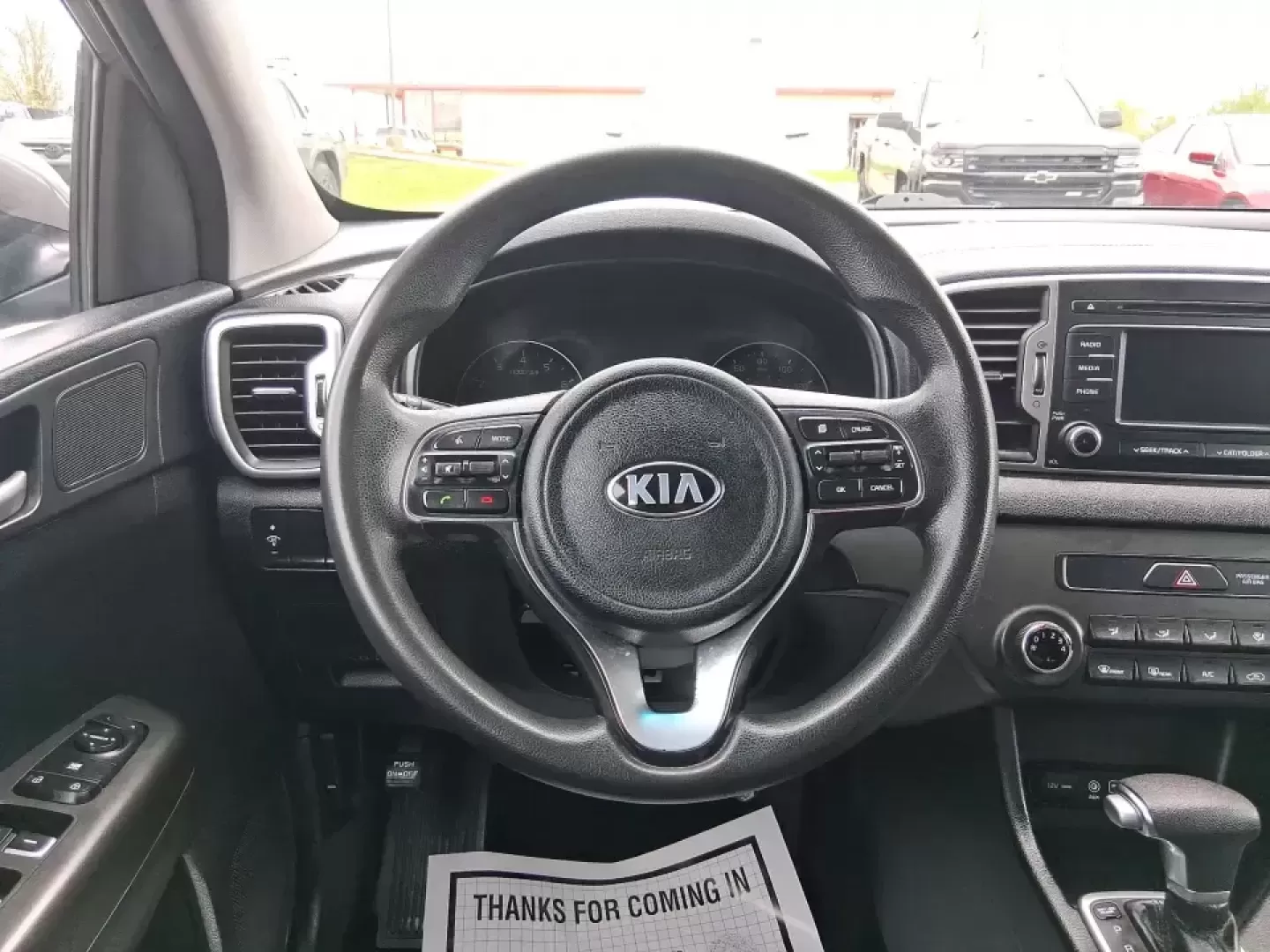 2018 Kia Sportage LX (KNDPM3AC0J7) with an Theta II 2.4L I-4 gasoline direct injection engine, 6A transmission, located at 1099 N County Rd 25A , Troy, OH, 45373, (937) 908-9800, 40.057079, -84.212883 - Weekend road trips to the Miami County Fair, daily commutes down I75, or quick errands between Downtown Troy and the shops near West Main Street-this 2018 Kia Sportage LX is the kind of compact SUV that fits real life. With its versatile crossover layout, confident road manners, and smart cargo spac - Photo#16
