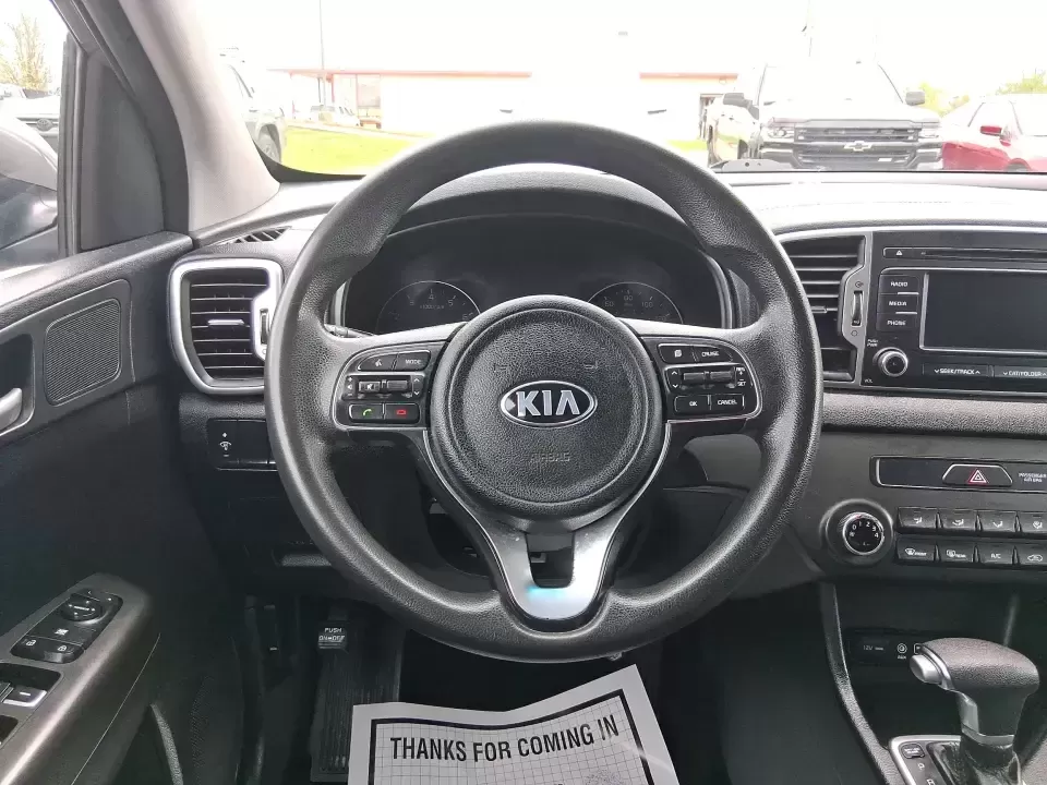 2018 Kia Sportage LX (KNDPM3AC0J7) with an Theta II 2.4L I-4 gasoline direct injection engine, 6A transmission, located at 1099 N County Rd 25A , Troy, OH, 45373, (937) 908-9800, 40.057079, -84.212883 - Weekend road trips to the Miami County Fair, daily commutes down I75, or quick errands between Downtown Troy and the shops near West Main Street-this 2018 Kia Sportage LX is the kind of compact SUV that fits real life. With its versatile crossover layout, confident road manners, and smart cargo spac - Photo#16