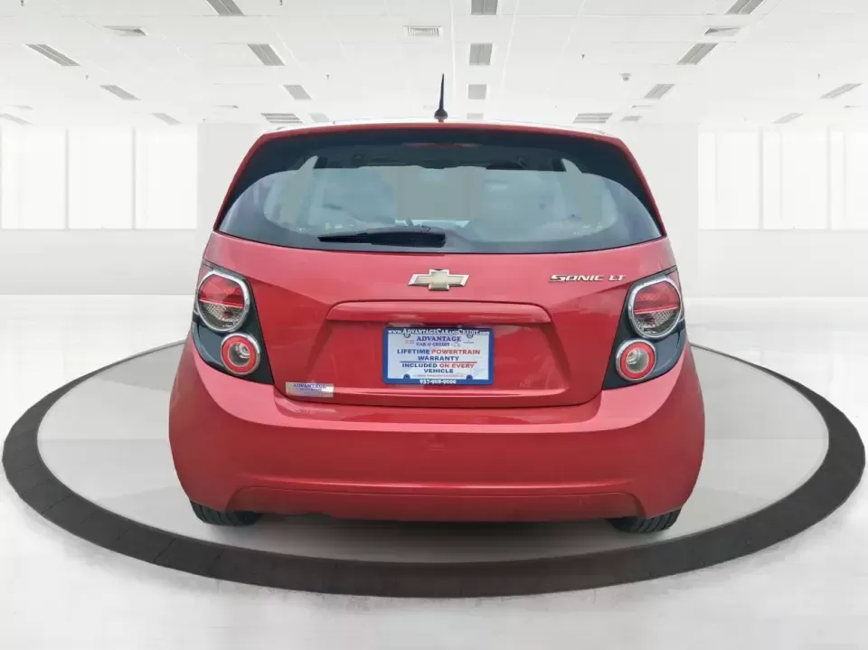 2014 Chevrolet Sonic LT Auto (1G1JC6SH7E4) with an 1.8L L4 DOHC 24V engine, 6-Speed Automatic transmission, located at 1099 N County Rd 25A , Troy, OH, 45373, (937) 908-9800, 40.057079, -84.212883 - Need a smart, easy-to-park commuter that still has room for grocery runs, school backpacks, and weekend getaways to Dayton or the Miami Valley? This 2014 Chevrolet Sonic LT Auto Hatchback delivers the kind of real-world versatility that fits everyday life in Troy-zippy around town, efficient for lon - Photo#3