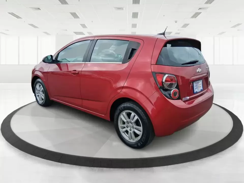 2014 Chevrolet Sonic LT Auto (1G1JC6SH7E4) with an 1.8L L4 DOHC 24V engine, 6-Speed Automatic transmission, located at 1099 N County Rd 25A , Troy, OH, 45373, (937) 908-9800, 40.057079, -84.212883 - Need a smart, easy-to-park commuter that still has room for grocery runs, school backpacks, and weekend getaways to Dayton or the Miami Valley? This 2014 Chevrolet Sonic LT Auto Hatchback delivers the kind of real-world versatility that fits everyday life in Troy-zippy around town, efficient for lon - Photo#4
