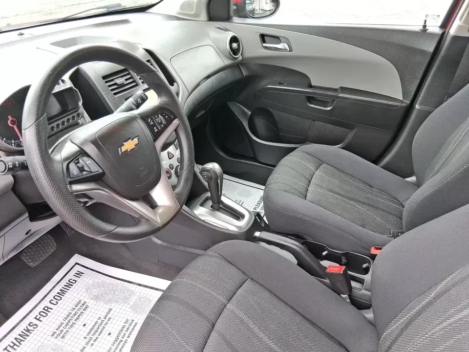 2014 Chevrolet Sonic LT Auto (1G1JC6SH7E4) with an 1.8L L4 DOHC 24V engine, 6-Speed Automatic transmission, located at 1099 N County Rd 25A , Troy, OH, 45373, (937) 908-9800, 40.057079, -84.212883 - Need a smart, easy-to-park commuter that still has room for grocery runs, school backpacks, and weekend getaways to Dayton or the Miami Valley? This 2014 Chevrolet Sonic LT Auto Hatchback delivers the kind of real-world versatility that fits everyday life in Troy-zippy around town, efficient for lon - Photo#9