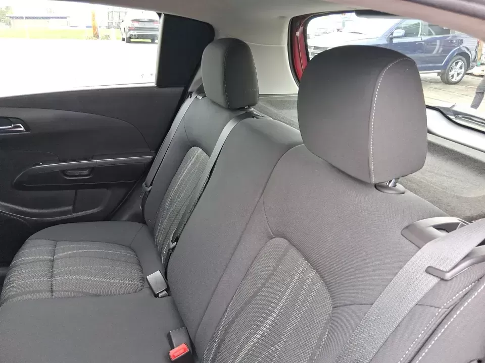 2014 Chevrolet Sonic LT Auto (1G1JC6SH7E4) with an 1.8L L4 DOHC 24V engine, 6-Speed Automatic transmission, located at 1099 N County Rd 25A , Troy, OH, 45373, (937) 908-9800, 40.057079, -84.212883 - Need a smart, easy-to-park commuter that still has room for grocery runs, school backpacks, and weekend getaways to Dayton or the Miami Valley? This 2014 Chevrolet Sonic LT Auto Hatchback delivers the kind of real-world versatility that fits everyday life in Troy-zippy around town, efficient for lon - Photo#10