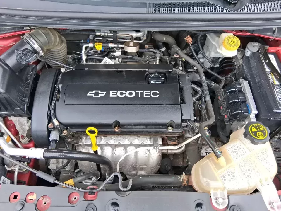 2014 Chevrolet Sonic LT Auto (1G1JC6SH7E4) with an 1.8L L4 DOHC 24V engine, 6-Speed Automatic transmission, located at 1099 N County Rd 25A , Troy, OH, 45373, (937) 908-9800, 40.057079, -84.212883 - Need a smart, easy-to-park commuter that still has room for grocery runs, school backpacks, and weekend getaways to Dayton or the Miami Valley? This 2014 Chevrolet Sonic LT Auto Hatchback delivers the kind of real-world versatility that fits everyday life in Troy-zippy around town, efficient for lon - Photo#11