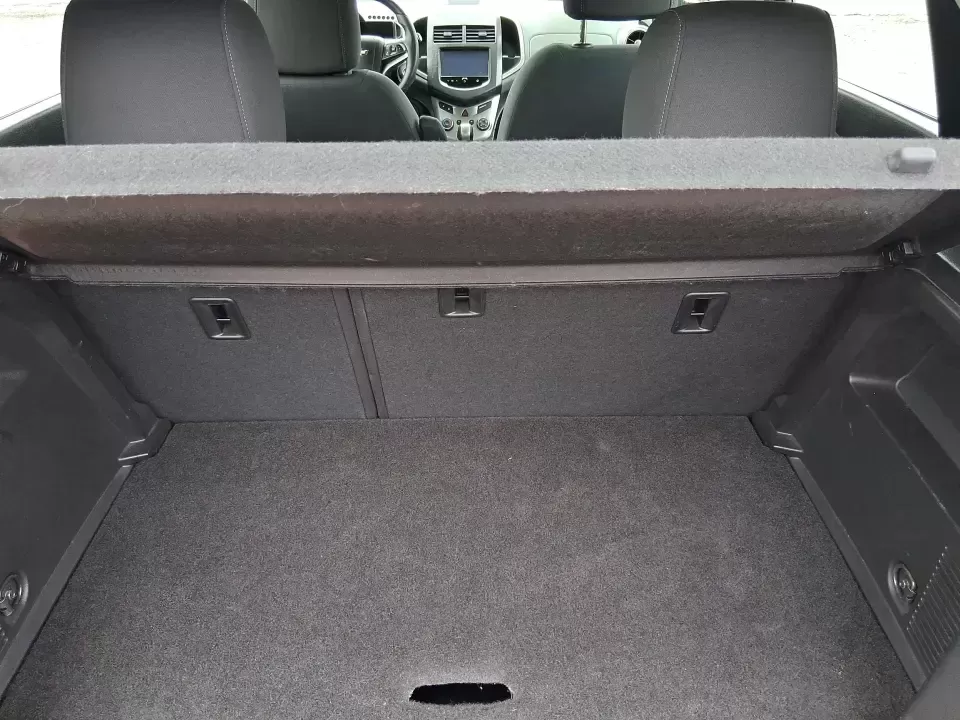 2014 Chevrolet Sonic LT Auto (1G1JC6SH7E4) with an 1.8L L4 DOHC 24V engine, 6-Speed Automatic transmission, located at 1099 N County Rd 25A , Troy, OH, 45373, (937) 908-9800, 40.057079, -84.212883 - Need a smart, easy-to-park commuter that still has room for grocery runs, school backpacks, and weekend getaways to Dayton or the Miami Valley? This 2014 Chevrolet Sonic LT Auto Hatchback delivers the kind of real-world versatility that fits everyday life in Troy-zippy around town, efficient for lon - Photo#12