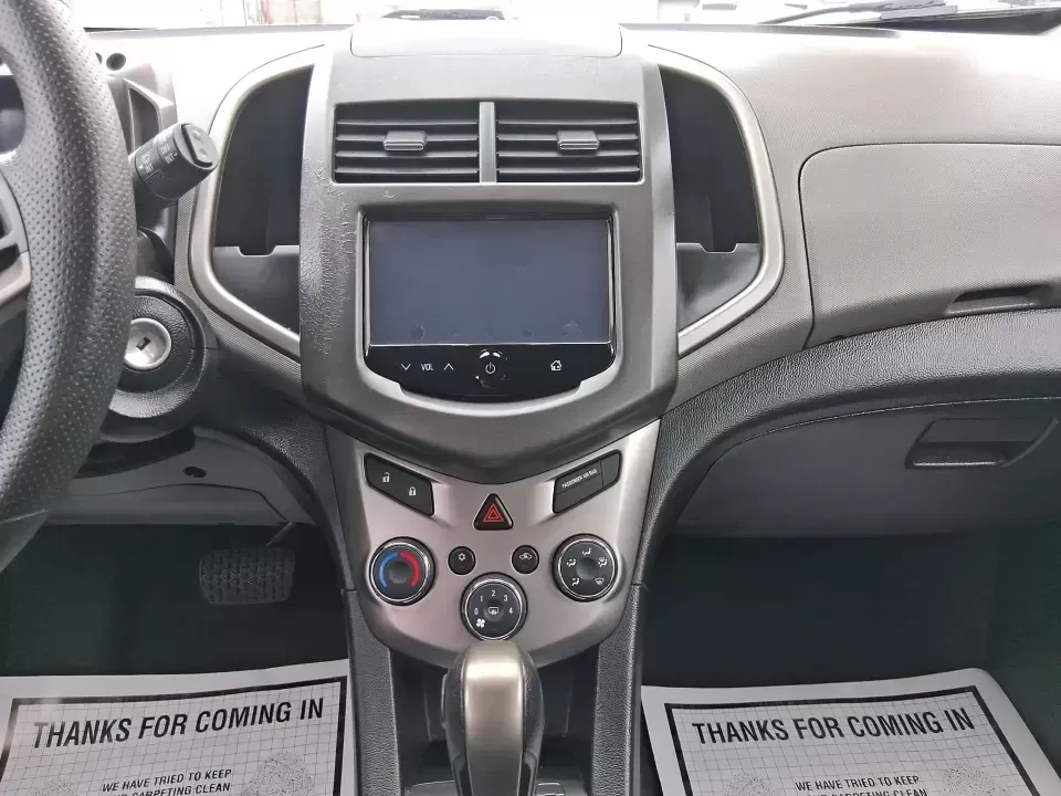 2014 Chevrolet Sonic LT Auto (1G1JC6SH7E4) with an 1.8L L4 DOHC 24V engine, 6-Speed Automatic transmission, located at 1099 N County Rd 25A , Troy, OH, 45373, (937) 908-9800, 40.057079, -84.212883 - Need a smart, easy-to-park commuter that still has room for grocery runs, school backpacks, and weekend getaways to Dayton or the Miami Valley? This 2014 Chevrolet Sonic LT Auto Hatchback delivers the kind of real-world versatility that fits everyday life in Troy-zippy around town, efficient for lon - Photo#13