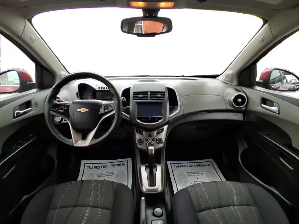 2014 Chevrolet Sonic LT Auto (1G1JC6SH7E4) with an 1.8L L4 DOHC 24V engine, 6-Speed Automatic transmission, located at 1099 N County Rd 25A , Troy, OH, 45373, (937) 908-9800, 40.057079, -84.212883 - Need a smart, easy-to-park commuter that still has room for grocery runs, school backpacks, and weekend getaways to Dayton or the Miami Valley? This 2014 Chevrolet Sonic LT Auto Hatchback delivers the kind of real-world versatility that fits everyday life in Troy-zippy around town, efficient for lon - Photo#20