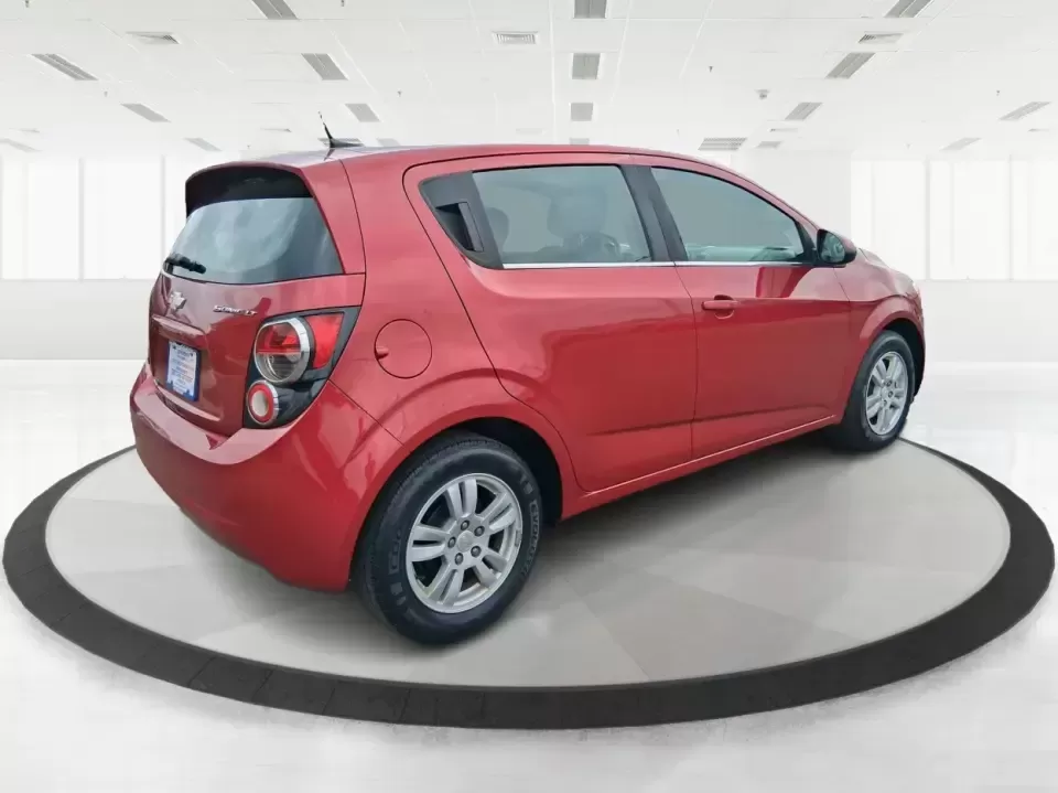2014 Chevrolet Sonic LT Auto (1G1JC6SH7E4) with an 1.8L L4 DOHC 24V engine, 6-Speed Automatic transmission, located at 1230 East Main St, Xenia, OH, 45385, (937) 908-9800, 39.688026, -83.910172 - Need a smart, easy-to-park commuter that still has room for grocery runs, school backpacks, and weekend getaways to Dayton or the Miami Valley? This 2014 Chevrolet Sonic LT Auto Hatchback delivers the kind of real-world versatility that fits everyday life in Troy-zippy around town, efficient for lon - Photo#2