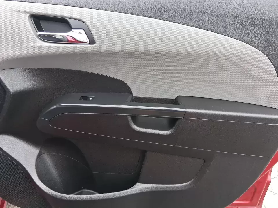 2014 Chevrolet Sonic LT Auto (1G1JC6SH7E4) with an 1.8L L4 DOHC 24V engine, 6-Speed Automatic transmission, located at 1230 East Main St, Xenia, OH, 45385, (937) 908-9800, 39.688026, -83.910172 - Need a smart, easy-to-park commuter that still has room for grocery runs, school backpacks, and weekend getaways to Dayton or the Miami Valley? This 2014 Chevrolet Sonic LT Auto Hatchback delivers the kind of real-world versatility that fits everyday life in Troy-zippy around town, efficient for lon - Photo#19