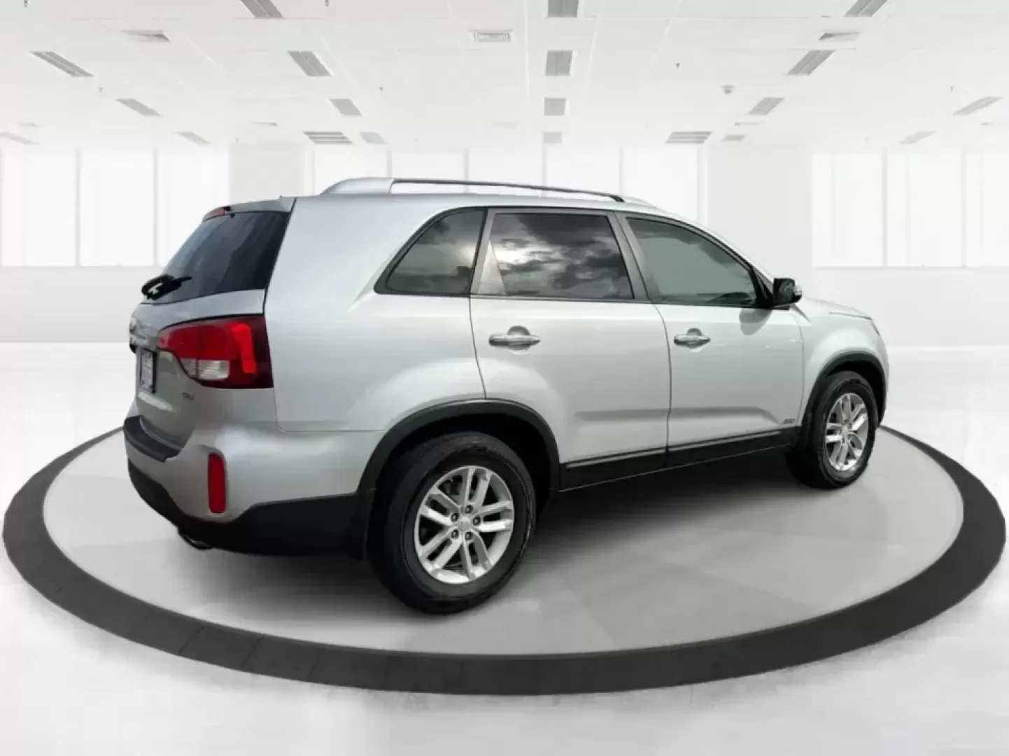 2014 Kia Sorento LX V6 (5XYKTDA74EG) with an Lambda II 3.3L V-6 gasoline direct injection engine, 6-Speed Automatic transmission, located at 8750 N County Rd 25A, Piqua, OH, 45356, (937) 908-9800, 40.164391, -84.232513 - Picture your next Ohio weekend: the kids loaded up for a day at Johnston Farm and Indian Agency, groceries stowed for the week, and enough power on tap to handle I75 merges without breaking a sweat. This 2014 Kia Sorento LX V6 in Bright Silver is the kind of do-it-all SUV that fits real life in Pi - Photo#2