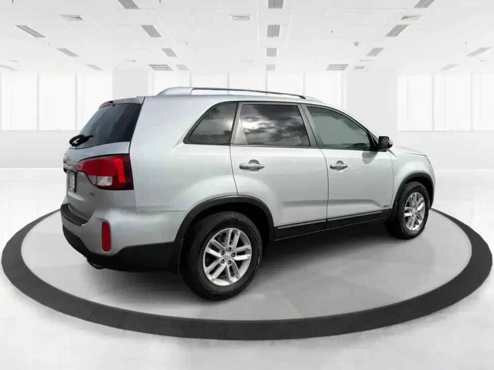 2014 Kia Sorento LX V6 (5XYKTDA74EG) with an Lambda II 3.3L V-6 gasoline direct injection engine, 6-Speed Automatic transmission, located at 4508 South Dixie Dr, Moraine, OH, 45439, (937) 908-9800, 39.689976, -84.218452 - Picture your next Ohio weekend: the kids loaded up for a day at Johnston Farm and Indian Agency, groceries stowed for the week, and enough power on tap to handle I75 merges without breaking a sweat. This 2014 Kia Sorento LX V6 in Bright Silver is the kind of do-it-all SUV that fits real life in Pi - Photo#2