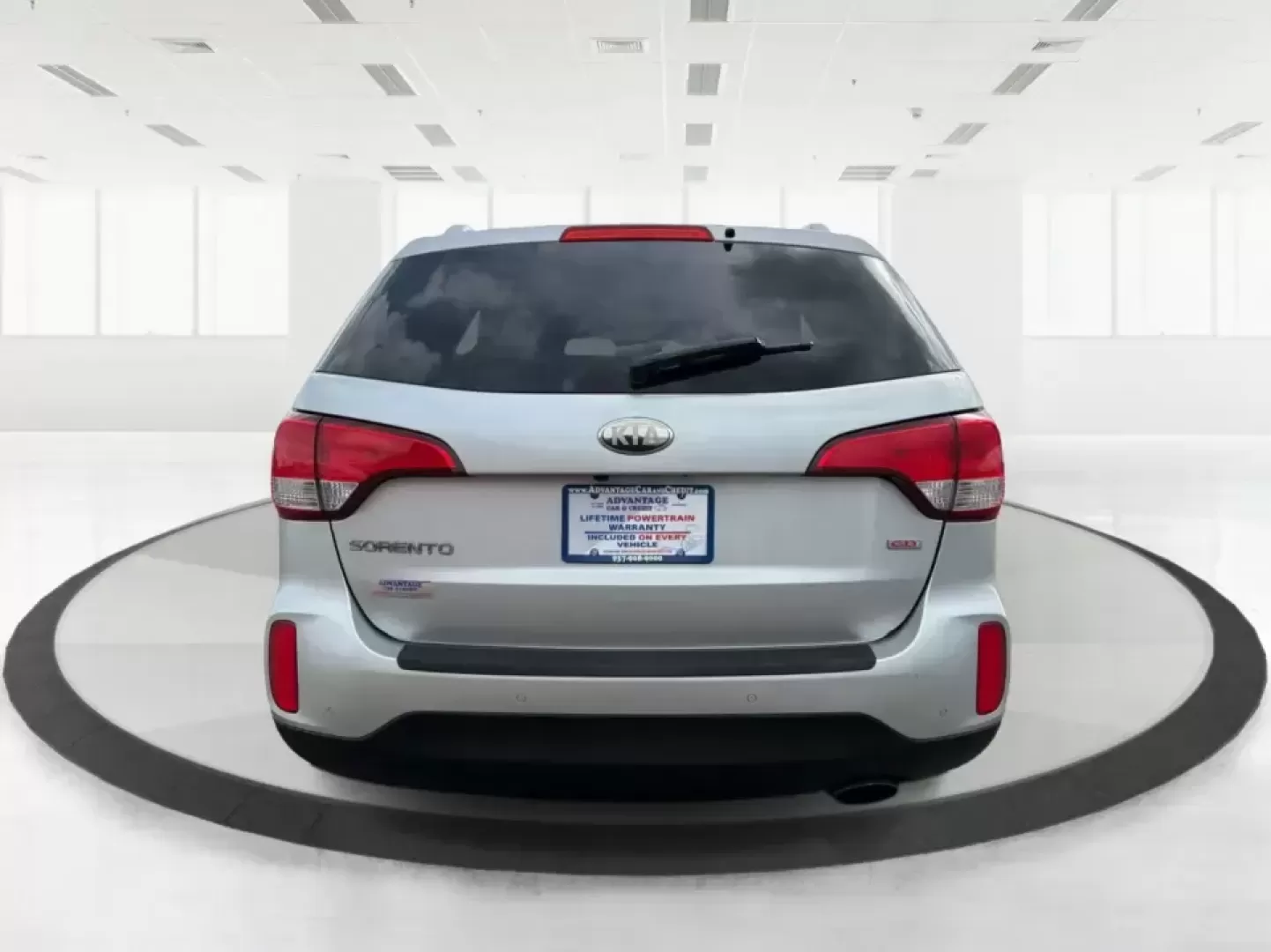 2014 Kia Sorento LX V6 (5XYKTDA74EG) with an Lambda II 3.3L V-6 gasoline direct injection engine, 6-Speed Automatic transmission, located at 8750 N County Rd 25A, Piqua, OH, 45356, (937) 908-9800, 40.164391, -84.232513 - Picture your next Ohio weekend: the kids loaded up for a day at Johnston Farm and Indian Agency, groceries stowed for the week, and enough power on tap to handle I75 merges without breaking a sweat. This 2014 Kia Sorento LX V6 in Bright Silver is the kind of do-it-all SUV that fits real life in Pi - Photo#3