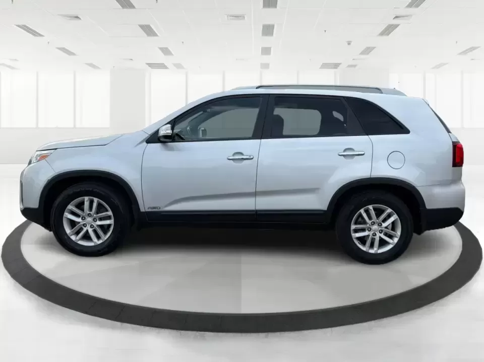 2014 Kia Sorento LX V6 (5XYKTDA74EG) with an Lambda II 3.3L V-6 gasoline direct injection engine, 6-Speed Automatic transmission, located at 4508 South Dixie Dr, Moraine, OH, 45439, (937) 908-9800, 39.689976, -84.218452 - Picture your next Ohio weekend: the kids loaded up for a day at Johnston Farm and Indian Agency, groceries stowed for the week, and enough power on tap to handle I75 merges without breaking a sweat. This 2014 Kia Sorento LX V6 in Bright Silver is the kind of do-it-all SUV that fits real life in Pi - Photo#5