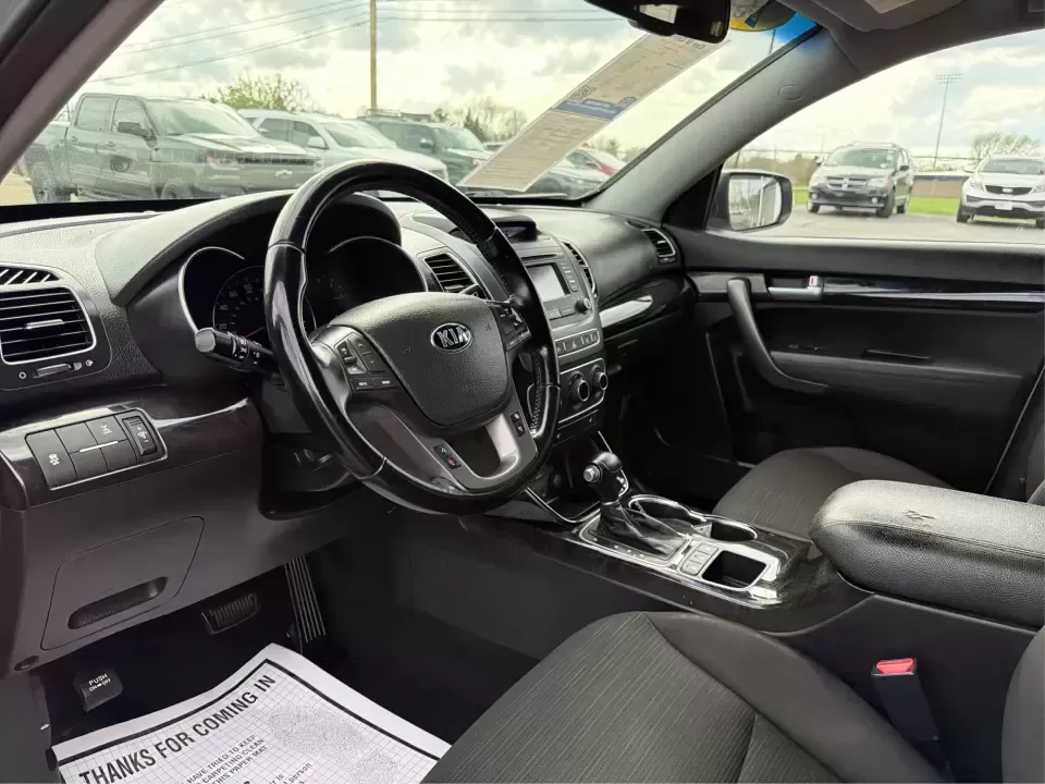 2014 Kia Sorento LX V6 (5XYKTDA74EG) with an Lambda II 3.3L V-6 gasoline direct injection engine, 6-Speed Automatic transmission, located at 4508 South Dixie Dr, Moraine, OH, 45439, (937) 908-9800, 39.689976, -84.218452 - Picture your next Ohio weekend: the kids loaded up for a day at Johnston Farm and Indian Agency, groceries stowed for the week, and enough power on tap to handle I75 merges without breaking a sweat. This 2014 Kia Sorento LX V6 in Bright Silver is the kind of do-it-all SUV that fits real life in Pi - Photo#9