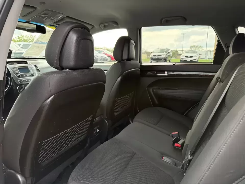 2014 Kia Sorento LX V6 (5XYKTDA74EG) with an Lambda II 3.3L V-6 gasoline direct injection engine, 6-Speed Automatic transmission, located at 4508 South Dixie Dr, Moraine, OH, 45439, (937) 908-9800, 39.689976, -84.218452 - Picture your next Ohio weekend: the kids loaded up for a day at Johnston Farm and Indian Agency, groceries stowed for the week, and enough power on tap to handle I75 merges without breaking a sweat. This 2014 Kia Sorento LX V6 in Bright Silver is the kind of do-it-all SUV that fits real life in Pi - Photo#10