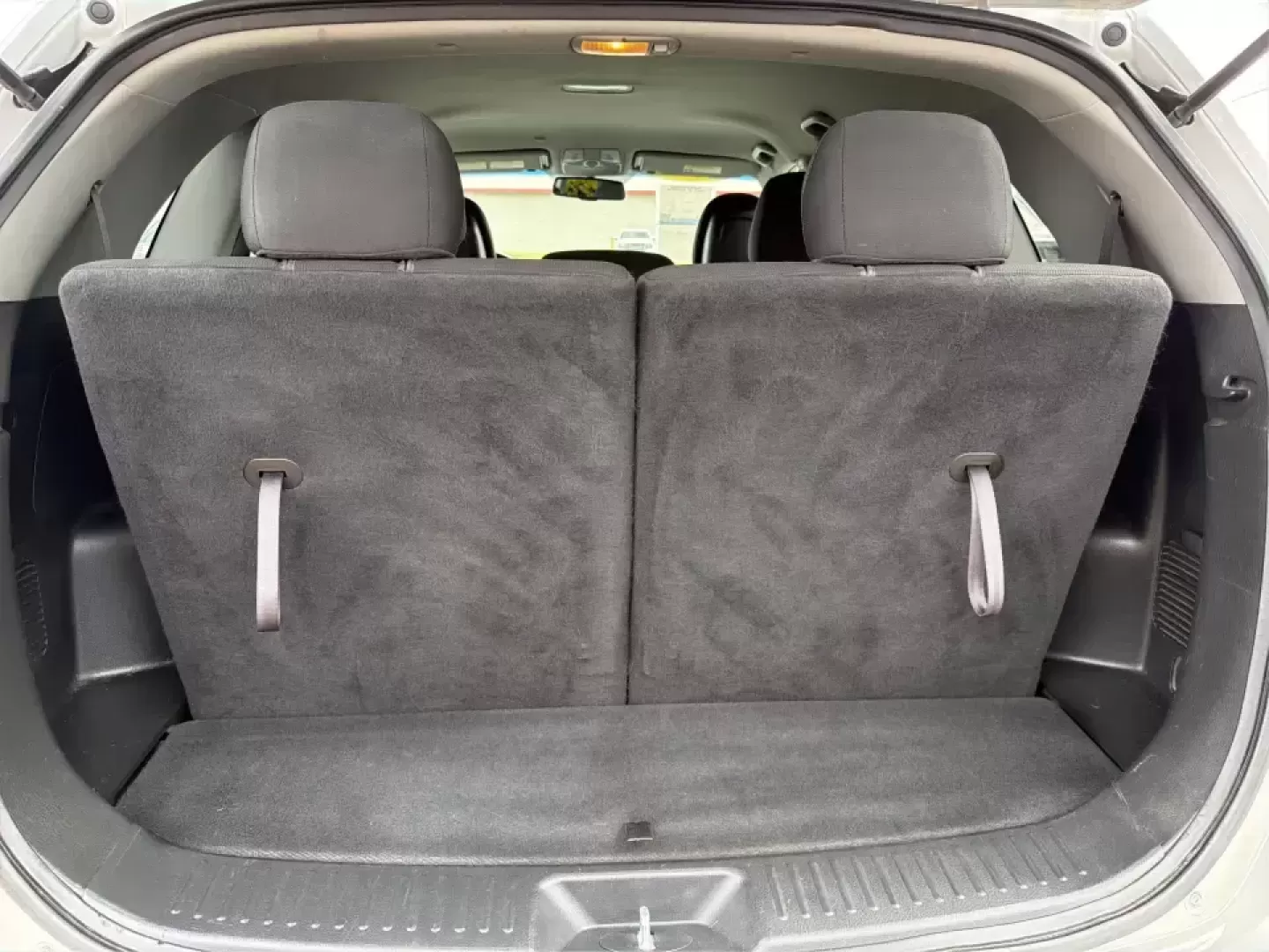 2014 Kia Sorento LX V6 (5XYKTDA74EG) with an Lambda II 3.3L V-6 gasoline direct injection engine, 6-Speed Automatic transmission, located at 8750 N County Rd 25A, Piqua, OH, 45356, (937) 908-9800, 40.164391, -84.232513 - Picture your next Ohio weekend: the kids loaded up for a day at Johnston Farm and Indian Agency, groceries stowed for the week, and enough power on tap to handle I75 merges without breaking a sweat. This 2014 Kia Sorento LX V6 in Bright Silver is the kind of do-it-all SUV that fits real life in Pi - Photo#12