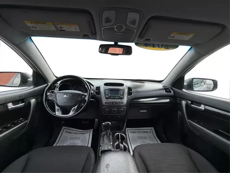 2014 Kia Sorento LX V6 (5XYKTDA74EG) with an Lambda II 3.3L V-6 gasoline direct injection engine, 6-Speed Automatic transmission, located at 4508 South Dixie Dr, Moraine, OH, 45439, (937) 908-9800, 39.689976, -84.218452 - Picture your next Ohio weekend: the kids loaded up for a day at Johnston Farm and Indian Agency, groceries stowed for the week, and enough power on tap to handle I75 merges without breaking a sweat. This 2014 Kia Sorento LX V6 in Bright Silver is the kind of do-it-all SUV that fits real life in Pi - Photo#21