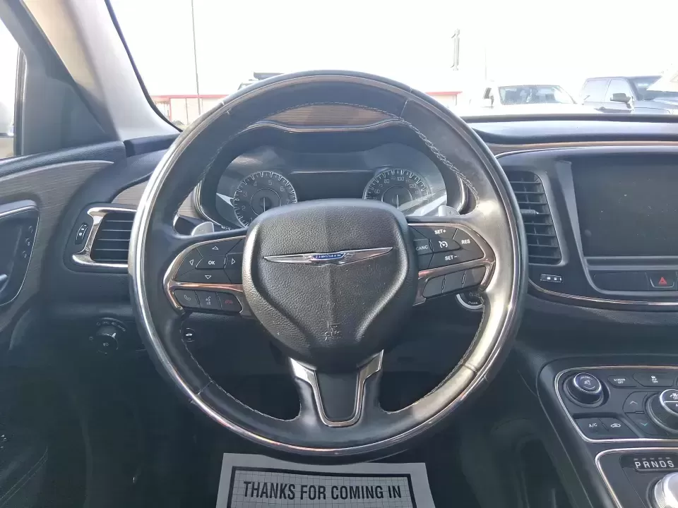 2015 Chrysler 200 C (1C3CCCCG6FN) with an 3.6L V6 DOHC 24V FFV engine, 9-Speed Automatic transmission, located at 8750 N County Rd 25A, Piqua, OH, 45356, (937) 908-9800, 40.164391, -84.232513 - Need a dependable sedan for the daily commute up I75, quick school drop-offs, or a comfortable weekend drive to downtown Piqua and the Great Miami River Trail? This 2015 Chrysler 200 C is the kind of practical-yet-upgraded ride that fits real life-quiet on longer trips, easy to park around local sho - Photo#16