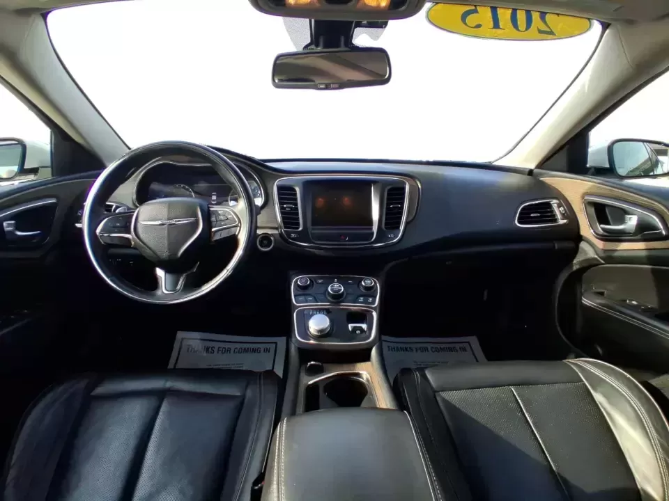 2015 Chrysler 200 C (1C3CCCCG6FN) with an 3.6L V6 DOHC 24V FFV engine, 9-Speed Automatic transmission, located at 8750 N County Rd 25A, Piqua, OH, 45356, (937) 908-9800, 40.164391, -84.232513 - Need a dependable sedan for the daily commute up I75, quick school drop-offs, or a comfortable weekend drive to downtown Piqua and the Great Miami River Trail? This 2015 Chrysler 200 C is the kind of practical-yet-upgraded ride that fits real life-quiet on longer trips, easy to park around local sho - Photo#21