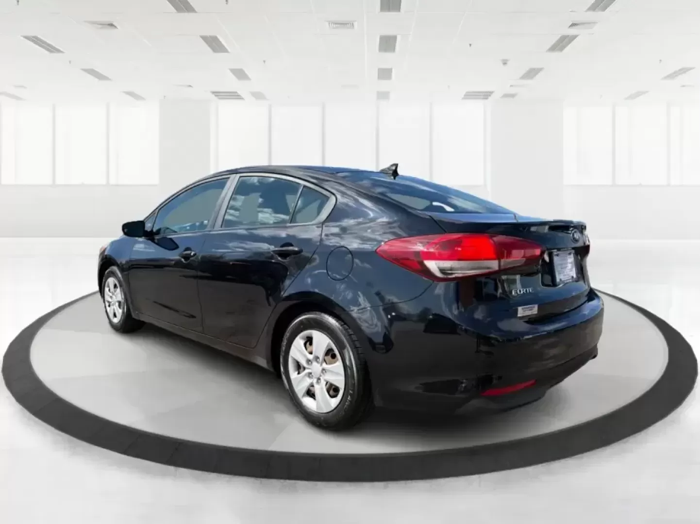 2018 Kia Forte LX (3KPFK4A79JE) with an 2L I-4 DOHC engine, 6M transmission, located at 880 E. National Road, Vandalia, OH, 45377, (937) 908-9800, 39.891918, -84.183594 - Need a dependable commuter that's easy to park downtown, comfortable for I-75 and SR-725 traffic, and still stylish enough for dinner in the Dayton area? This 2018 Kia Forte LX in Aurora Black is a smart, budget-friendly sedan that fits real life in Moraine, OH-whether you're stacking miles for work - Photo#4