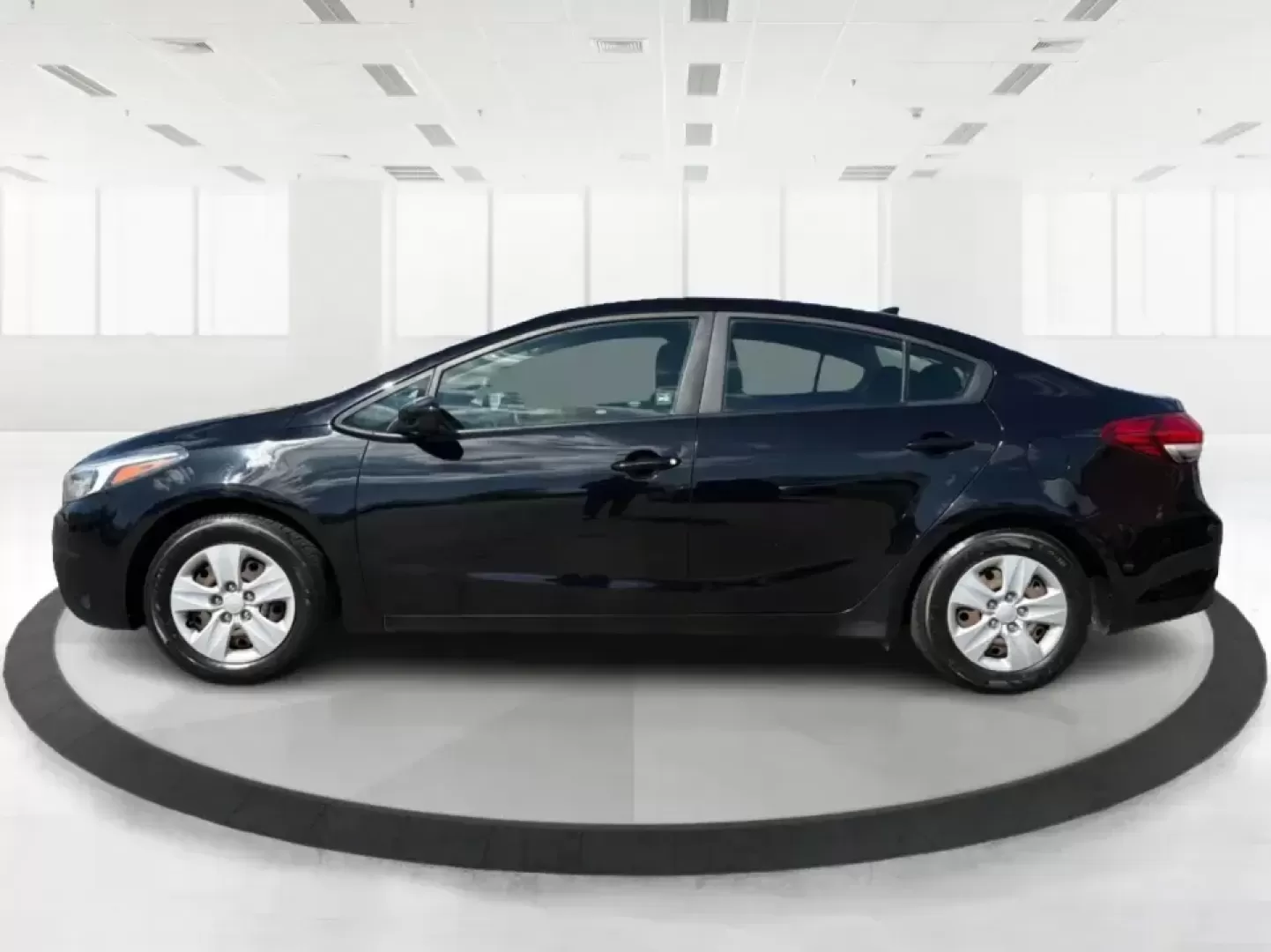 2018 Kia Forte LX (3KPFK4A79JE) with an 2L I-4 DOHC engine, 6M transmission, located at 880 E. National Road, Vandalia, OH, 45377, (937) 908-9800, 39.891918, -84.183594 - Need a dependable commuter that's easy to park downtown, comfortable for I-75 and SR-725 traffic, and still stylish enough for dinner in the Dayton area? This 2018 Kia Forte LX in Aurora Black is a smart, budget-friendly sedan that fits real life in Moraine, OH-whether you're stacking miles for work - Photo#5