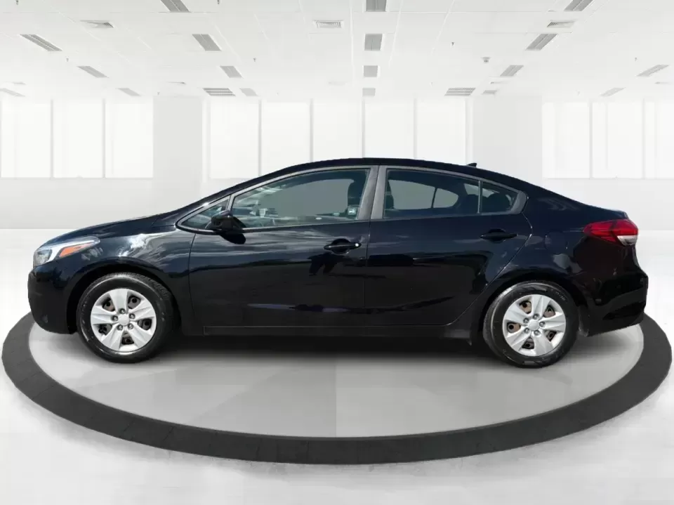 2018 Kia Forte LX (3KPFK4A79JE) with an 2L I-4 DOHC engine, 6M transmission, located at 4508 South Dixie Dr, Moraine, OH, 45439, (937) 908-9800, 39.689976, -84.218452 - Need a dependable commuter that's easy to park downtown, comfortable for I-75 and SR-725 traffic, and still stylish enough for dinner in the Dayton area? This 2018 Kia Forte LX in Aurora Black is a smart, budget-friendly sedan that fits real life in Moraine, OH-whether you're stacking miles for work - Photo#5