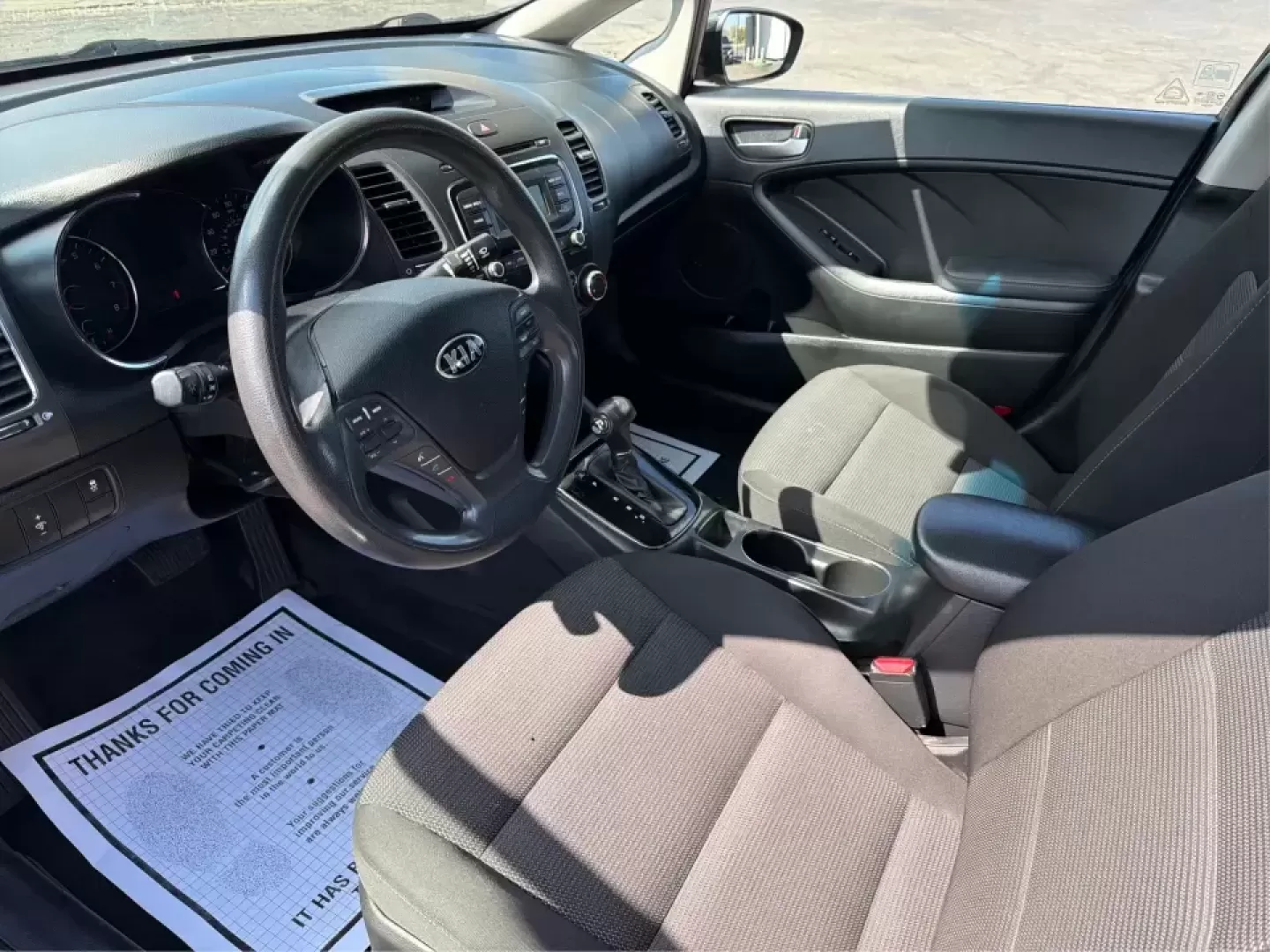 2018 Kia Forte LX (3KPFK4A79JE) with an 2L I-4 DOHC engine, 6M transmission, located at 880 E. National Road, Vandalia, OH, 45377, (937) 908-9800, 39.891918, -84.183594 - Need a dependable commuter that's easy to park downtown, comfortable for I-75 and SR-725 traffic, and still stylish enough for dinner in the Dayton area? This 2018 Kia Forte LX in Aurora Black is a smart, budget-friendly sedan that fits real life in Moraine, OH-whether you're stacking miles for work - Photo#9