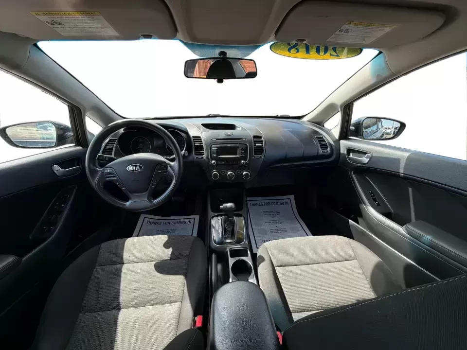 2018 Kia Forte LX (3KPFK4A79JE) with an 2L I-4 DOHC engine, 6M transmission, located at 4508 South Dixie Dr, Moraine, OH, 45439, (937) 908-9800, 39.689976, -84.218452 - Need a dependable commuter that's easy to park downtown, comfortable for I-75 and SR-725 traffic, and still stylish enough for dinner in the Dayton area? This 2018 Kia Forte LX in Aurora Black is a smart, budget-friendly sedan that fits real life in Moraine, OH-whether you're stacking miles for work - Photo#21