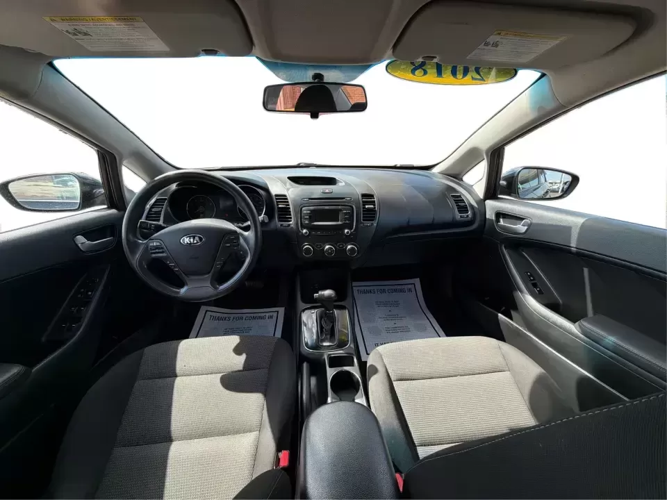 2018 Kia Forte LX (3KPFK4A79JE) with an 2L I-4 DOHC engine, 6M transmission, located at 4508 South Dixie Dr, Moraine, OH, 45439, (937) 908-9800, 39.689976, -84.218452 - Need a dependable commuter that's easy to park downtown, comfortable for I-75 and SR-725 traffic, and still stylish enough for dinner in the Dayton area? This 2018 Kia Forte LX in Aurora Black is a smart, budget-friendly sedan that fits real life in Moraine, OH-whether you're stacking miles for work - Photo#22