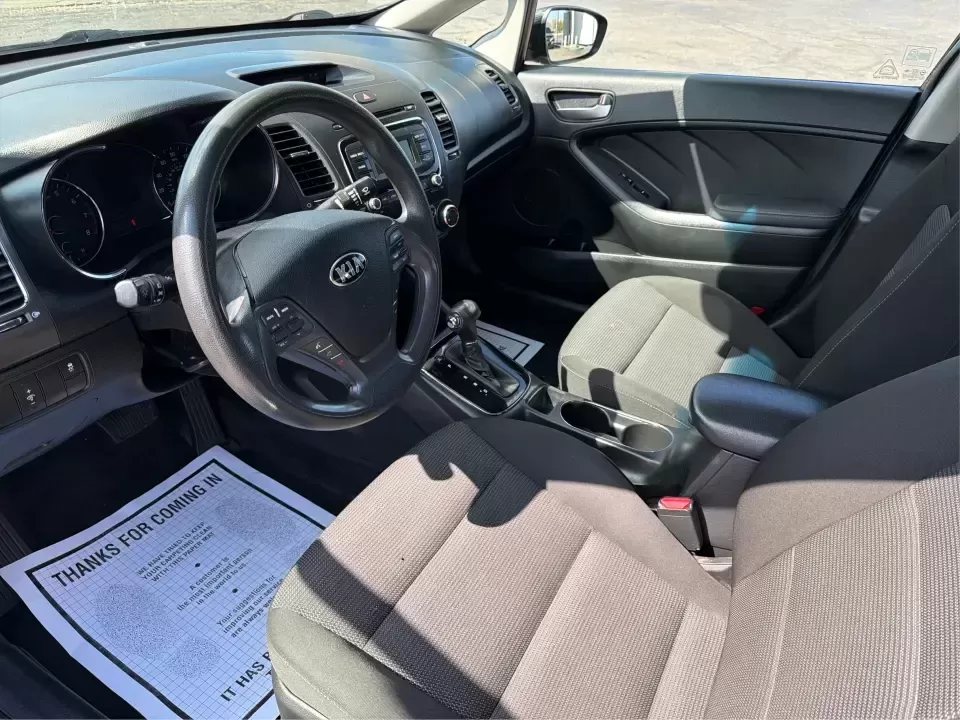 2018 Kia Forte LX (3KPFK4A79JE) with an 2L I-4 DOHC engine, 6M transmission, located at 1230 East Main St, Xenia, OH, 45385, (937) 908-9800, 39.688026, -83.910172 - Need a dependable commuter that's easy to park downtown, comfortable for I-75 and SR-725 traffic, and still stylish enough for dinner in the Dayton area? This 2018 Kia Forte LX in Aurora Black is a smart, budget-friendly sedan that fits real life in Moraine, OH-whether you're stacking miles for work - Photo#9