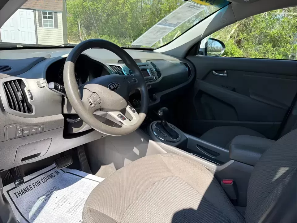 2014 Kia Sportage LX (KNDPBCAC6E7) with an 2.4L V6 DOHC 24V engine, 6-Speed Automatic transmission, located at 1230 East Main St, Xenia, OH, 45385, (937) 908-9800, 39.688026, -83.910172 - **Adventure Awaits: 2014 Kia Sportage LX Ready for Your Next Journey!**<br /> <br /> Are you in search of a reliable vehicle that combines style, comfort, and versatility? Look no further than this 2014 Kia Sportage LX, perfect for weekend getaways, family road trips, or daily commutes. This crossov - Photo#9