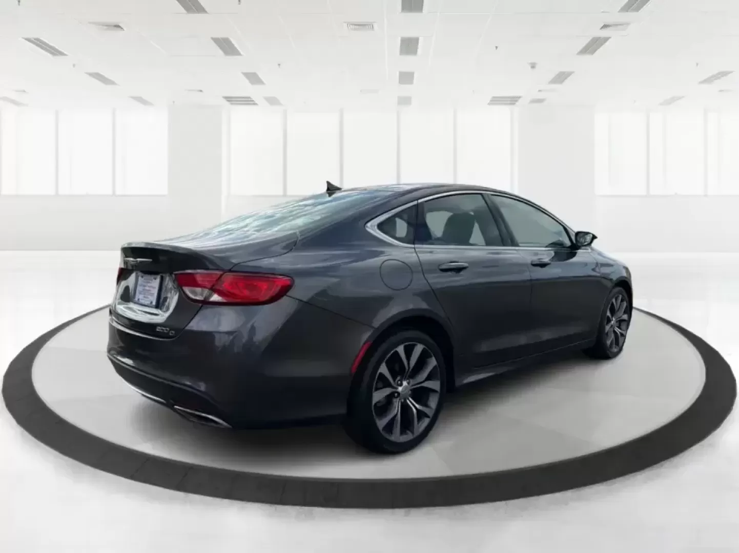 2015 Chrysler 200 C (1C3CCCCG7FN) with an 3.6L V6 DOHC 24V FFV engine, 9-Speed Automatic transmission, located at 880 E. National Road, Vandalia, OH, 45377, (937) 908-9800, 39.891918, -84.183594 - Set up for real life in the Miami Valley-school drop-offs, a long commute down I75, and comfortable weekend getaways-this 2015 Chrysler 200 C is the kind of midsize sedan that fits a busy schedule without feeling basic. With its smooth ride, strong V6 power, and upscale comfort features, it's a smar - Photo#2