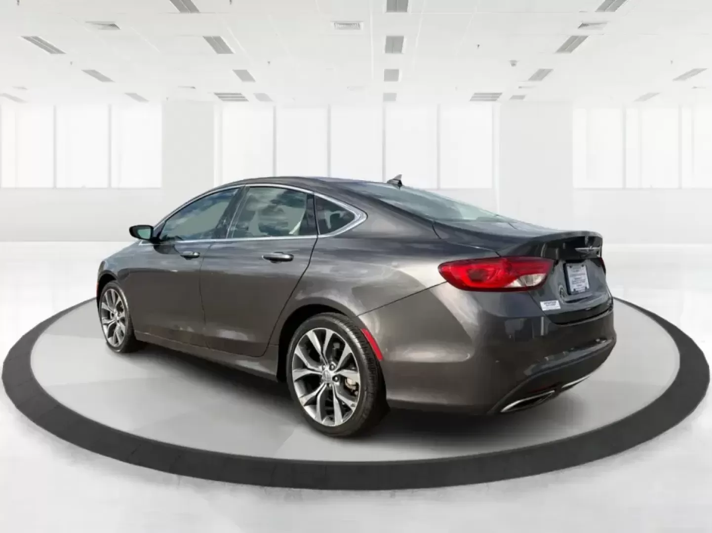 2015 Chrysler 200 C (1C3CCCCG7FN) with an 3.6L V6 DOHC 24V FFV engine, 9-Speed Automatic transmission, located at 880 E. National Road, Vandalia, OH, 45377, (937) 908-9800, 39.891918, -84.183594 - Set up for real life in the Miami Valley-school drop-offs, a long commute down I75, and comfortable weekend getaways-this 2015 Chrysler 200 C is the kind of midsize sedan that fits a busy schedule without feeling basic. With its smooth ride, strong V6 power, and upscale comfort features, it's a smar - Photo#4