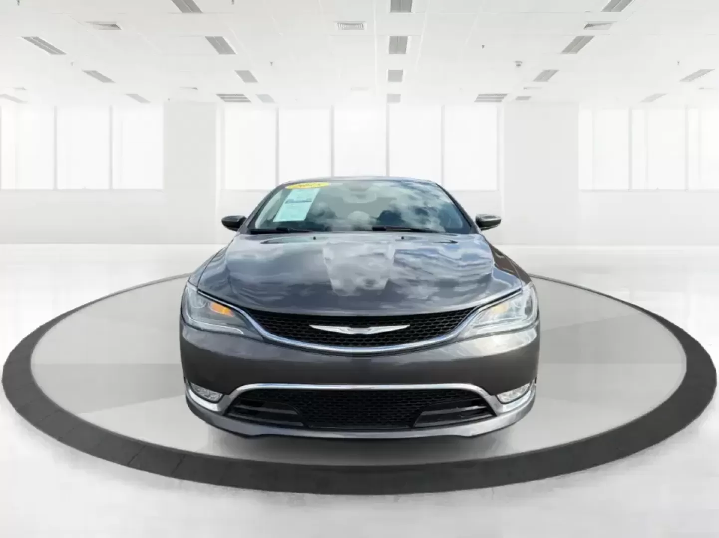 2015 Chrysler 200 C (1C3CCCCG7FN) with an 3.6L V6 DOHC 24V FFV engine, 9-Speed Automatic transmission, located at 880 E. National Road, Vandalia, OH, 45377, (937) 908-9800, 39.891918, -84.183594 - Set up for real life in the Miami Valley-school drop-offs, a long commute down I75, and comfortable weekend getaways-this 2015 Chrysler 200 C is the kind of midsize sedan that fits a busy schedule without feeling basic. With its smooth ride, strong V6 power, and upscale comfort features, it's a smar - Photo#7