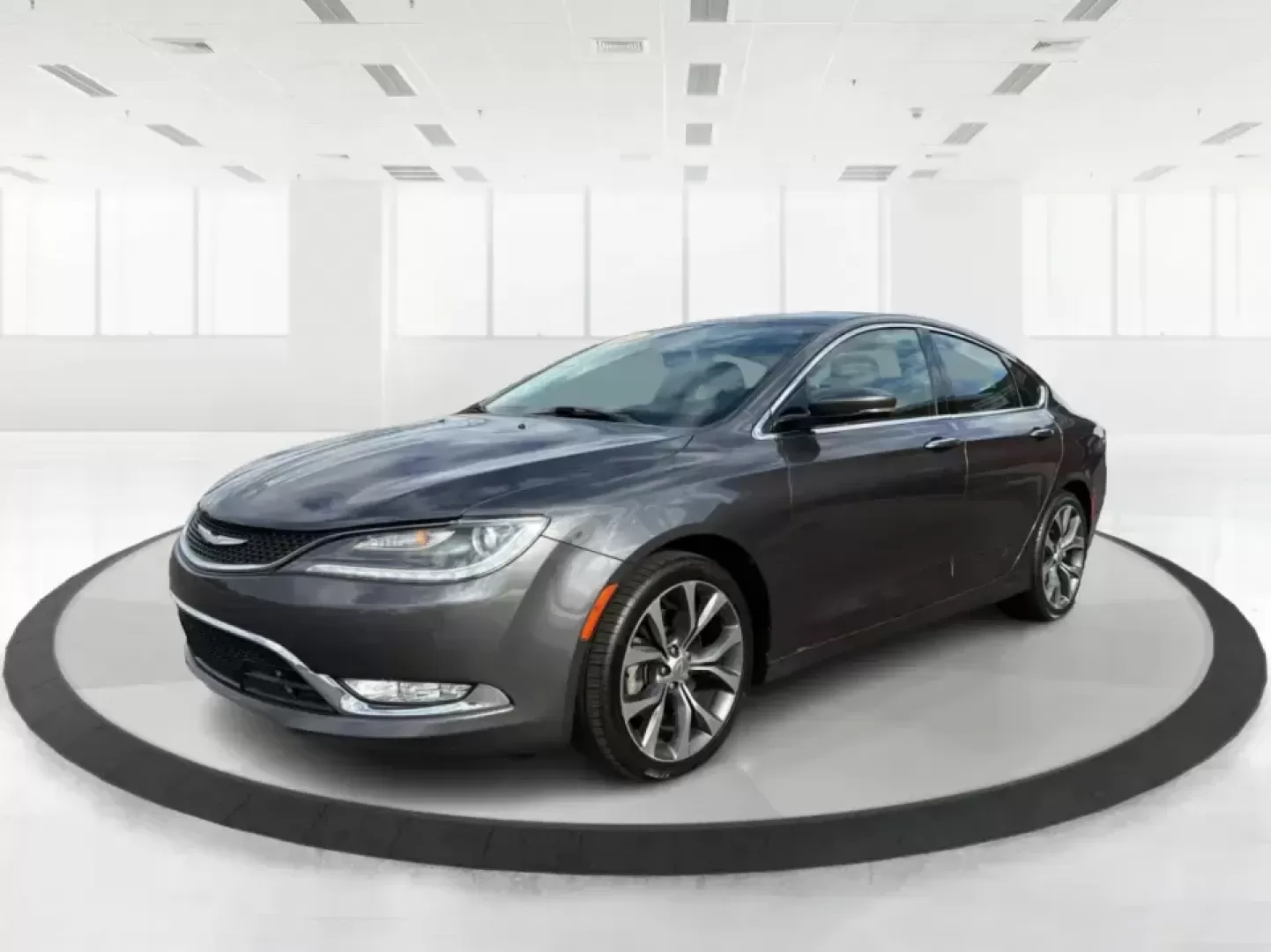 2015 Chrysler 200 C (1C3CCCCG7FN) with an 3.6L V6 DOHC 24V FFV engine, 9-Speed Automatic transmission, located at 880 E. National Road, Vandalia, OH, 45377, (937) 908-9800, 39.891918, -84.183594 - Set up for real life in the Miami Valley-school drop-offs, a long commute down I75, and comfortable weekend getaways-this 2015 Chrysler 200 C is the kind of midsize sedan that fits a busy schedule without feeling basic. With its smooth ride, strong V6 power, and upscale comfort features, it's a smar - Photo#8
