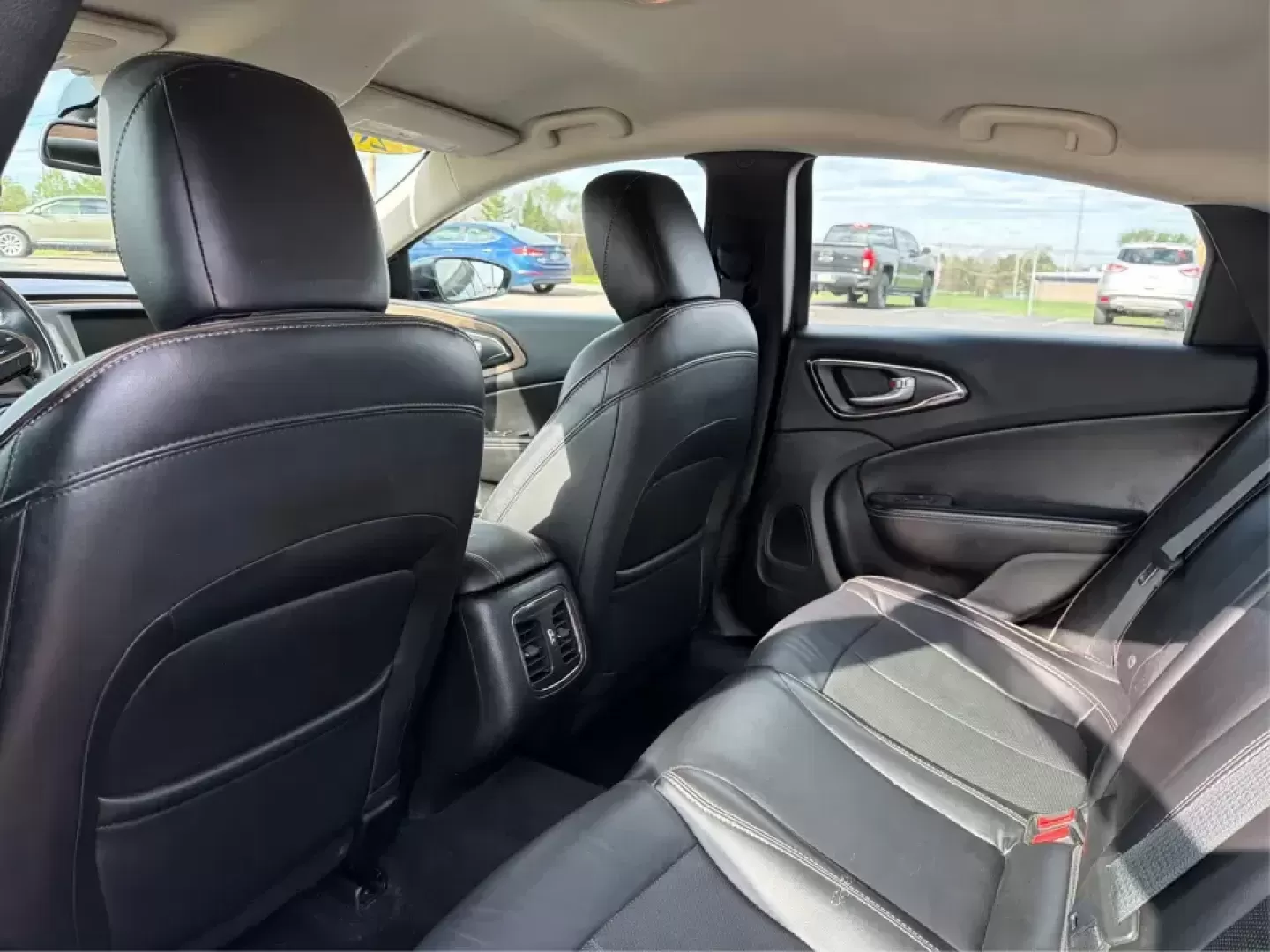 2015 Chrysler 200 C (1C3CCCCG7FN) with an 3.6L V6 DOHC 24V FFV engine, 9-Speed Automatic transmission, located at 880 E. National Road, Vandalia, OH, 45377, (937) 908-9800, 39.891918, -84.183594 - Set up for real life in the Miami Valley-school drop-offs, a long commute down I75, and comfortable weekend getaways-this 2015 Chrysler 200 C is the kind of midsize sedan that fits a busy schedule without feeling basic. With its smooth ride, strong V6 power, and upscale comfort features, it's a smar - Photo#10