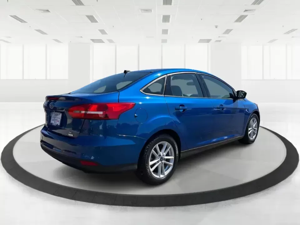 2018 Ford Focus SE (1FADP3FE5JL) with an 1.0L L3 engine, Automatic transmission, located at 1230 East Main St, Xenia, OH, 45385, (937) 908-9800, 39.688026, -83.910172 - Need a smart, budget-friendly commuter that's easy to live with all week and still ready for a spontaneous weekend escape? This 2018 Ford Focus SE sedan in eye-catching Lightning Blue Metallic is a practical pick for daily drives to Dayton, school drop-offs, and quick errands around Xenia-while keep - Photo#2
