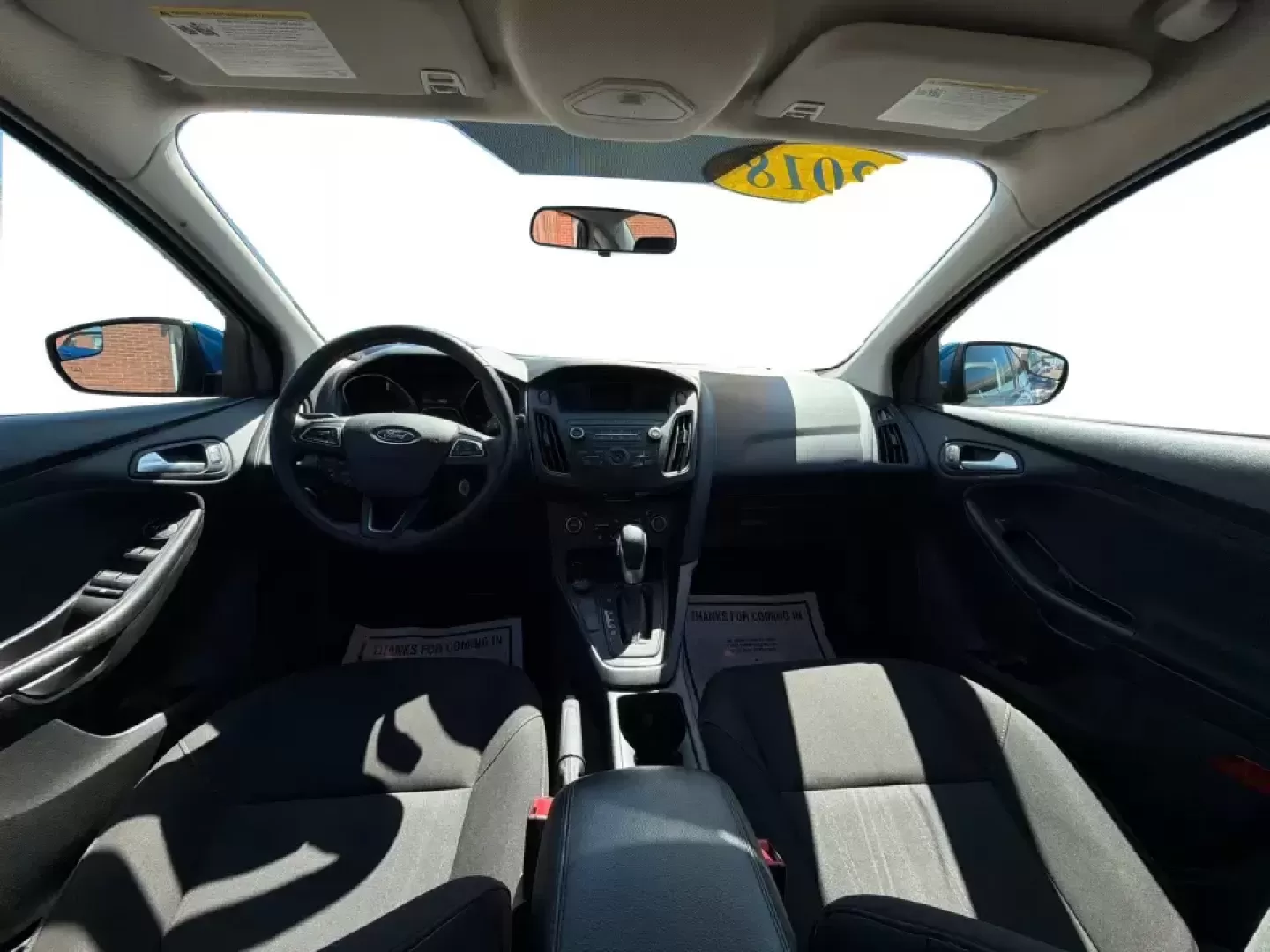 2018 Ford Focus SE (1FADP3FE5JL) with an 1.0L L3 engine, Automatic transmission, located at 1230 East Main St, Xenia, OH, 45385, (937) 908-9800, 39.688026, -83.910172 - Need a smart, budget-friendly commuter that's easy to live with all week and still ready for a spontaneous weekend escape? This 2018 Ford Focus SE sedan in eye-catching Lightning Blue Metallic is a practical pick for daily drives to Dayton, school drop-offs, and quick errands around Xenia-while keep - Photo#21