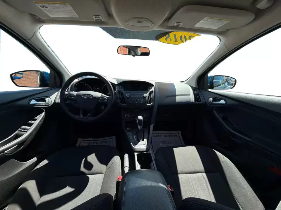 2018 Ford Focus SE (1FADP3FE5JL) with an 1.0L L3 engine, Automatic transmission, located at 1230 East Main St, Xenia, OH, 45385, (937) 908-9800, 39.688026, -83.910172 - Need a smart, budget-friendly commuter that's easy to live with all week and still ready for a spontaneous weekend escape? This 2018 Ford Focus SE sedan in eye-catching Lightning Blue Metallic is a practical pick for daily drives to Dayton, school drop-offs, and quick errands around Xenia-while keep - Photo#21