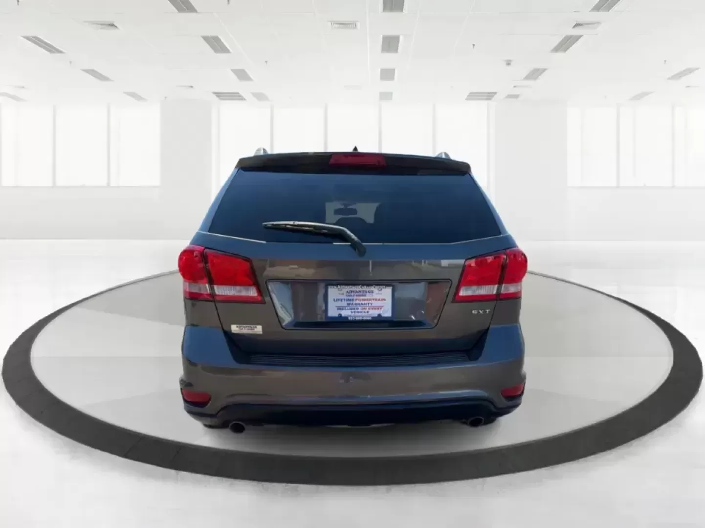 2014 Dodge Journey SXT (3C4PDDBG0ET) with an 3.6L V-6 DOHC engine, 6-Speed Automatic transmission, located at 1099 N County Rd 25A , Troy, OH, 45373, (937) 908-9800, 40.057079, -84.212883 - Pack up the kids, the dog, and the weekend bags-this 2014 Dodge Journey SXT is the kind of SUV that makes everyday life in Troy easier and spontaneous road trips feel completely doable. Whether you're tackling school drop-offs, commuting to Dayton, or planning a family day at the Miami County Fairgr - Photo#3