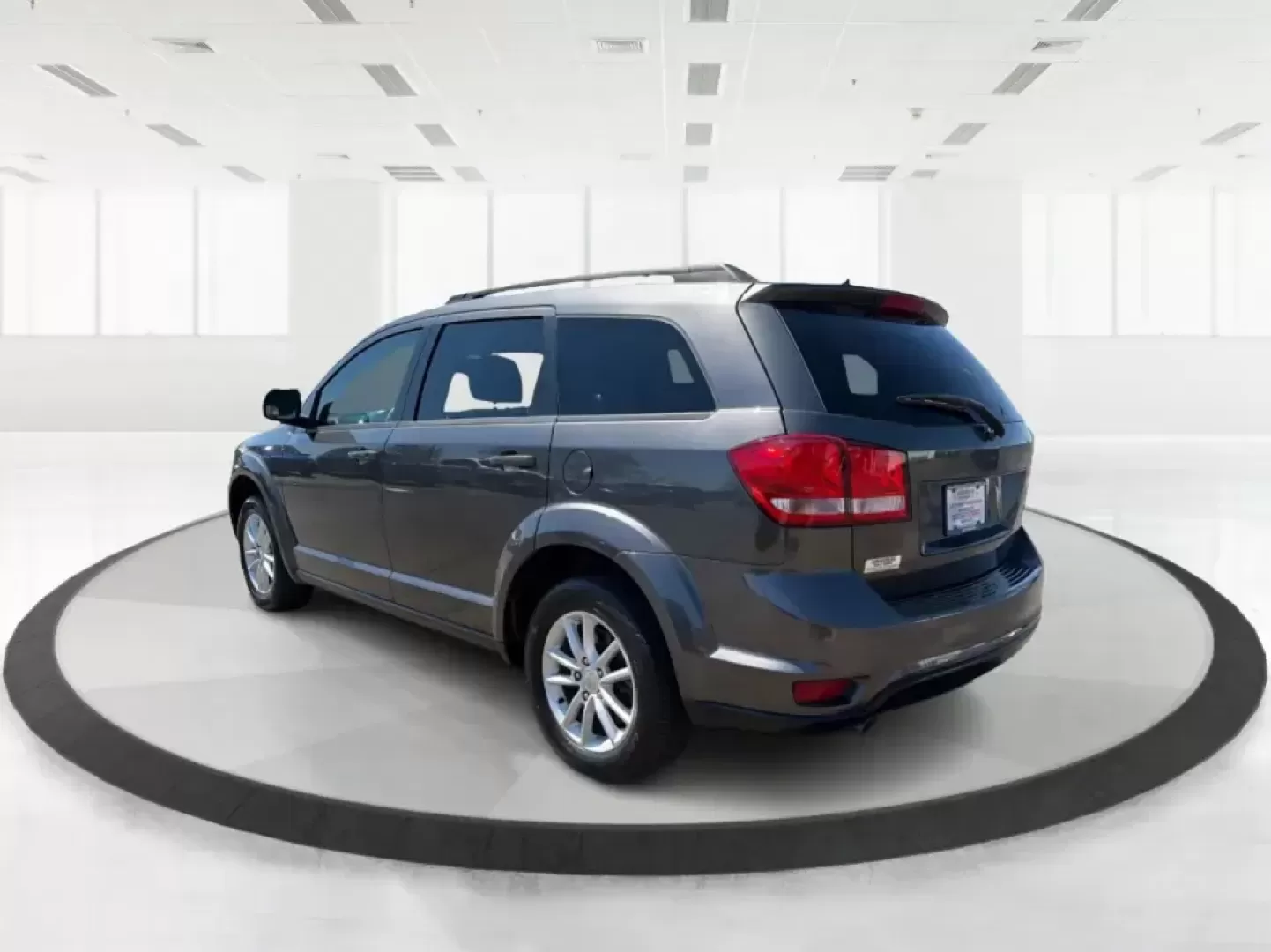 2014 Dodge Journey SXT (3C4PDDBG0ET) with an 3.6L V-6 DOHC engine, 6-Speed Automatic transmission, located at 1099 N County Rd 25A , Troy, OH, 45373, (937) 908-9800, 40.057079, -84.212883 - Pack up the kids, the dog, and the weekend bags-this 2014 Dodge Journey SXT is the kind of SUV that makes everyday life in Troy easier and spontaneous road trips feel completely doable. Whether you're tackling school drop-offs, commuting to Dayton, or planning a family day at the Miami County Fairgr - Photo#4