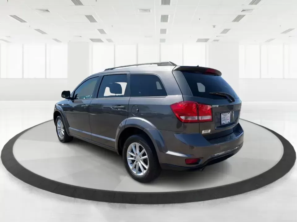 2014 Dodge Journey SXT (3C4PDDBG0ET) with an 3.6L V-6 DOHC engine, 6-Speed Automatic transmission, located at 1099 N County Rd 25A , Troy, OH, 45373, (937) 908-9800, 40.057079, -84.212883 - Pack up the kids, the dog, and the weekend bags-this 2014 Dodge Journey SXT is the kind of SUV that makes everyday life in Troy easier and spontaneous road trips feel completely doable. Whether you're tackling school drop-offs, commuting to Dayton, or planning a family day at the Miami County Fairgr - Photo#4