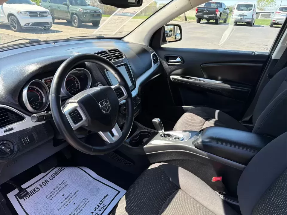 2014 Dodge Journey SXT (3C4PDDBG0ET) with an 3.6L V-6 DOHC engine, 6-Speed Automatic transmission, located at 1099 N County Rd 25A , Troy, OH, 45373, (937) 908-9800, 40.057079, -84.212883 - Pack up the kids, the dog, and the weekend bags-this 2014 Dodge Journey SXT is the kind of SUV that makes everyday life in Troy easier and spontaneous road trips feel completely doable. Whether you're tackling school drop-offs, commuting to Dayton, or planning a family day at the Miami County Fairgr - Photo#9