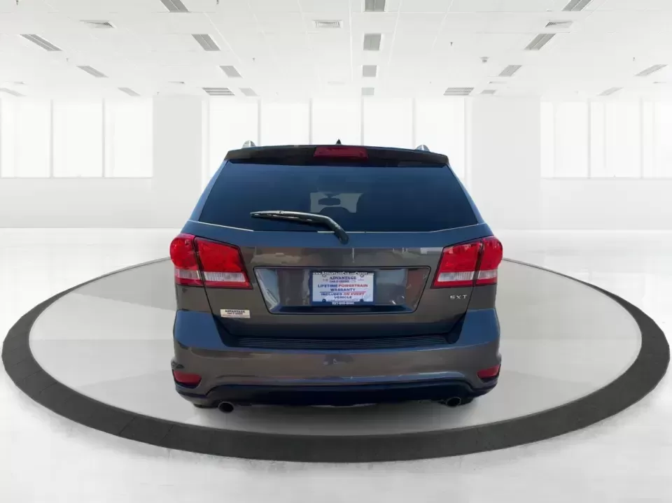 2014 Dodge Journey SXT (3C4PDDBG0ET) with an 3.6L V-6 DOHC engine, 6-Speed Automatic transmission, located at 1184 Kauffman Ave, Fairborn, OH, 45324, (937) 908-9800, 39.807072, -84.030914 - Pack up the kids, the dog, and the weekend bags-this 2014 Dodge Journey SXT is the kind of SUV that makes everyday life in Troy easier and spontaneous road trips feel completely doable. Whether you're tackling school drop-offs, commuting to Dayton, or planning a family day at the Miami County Fairgr - Photo#3