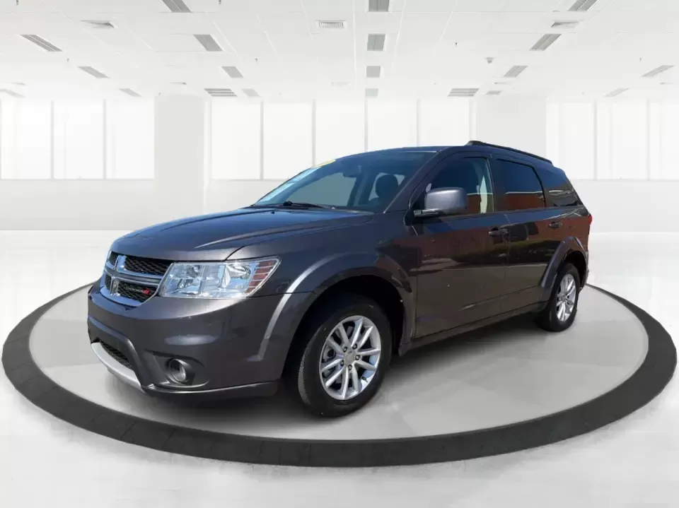 2014 Dodge Journey SXT (3C4PDDBG0ET) with an 3.6L V-6 DOHC engine, 6-Speed Automatic transmission, located at 1184 Kauffman Ave, Fairborn, OH, 45324, (937) 908-9800, 39.807072, -84.030914 - Pack up the kids, the dog, and the weekend bags-this 2014 Dodge Journey SXT is the kind of SUV that makes everyday life in Troy easier and spontaneous road trips feel completely doable. Whether you're tackling school drop-offs, commuting to Dayton, or planning a family day at the Miami County Fairgr - Photo#8