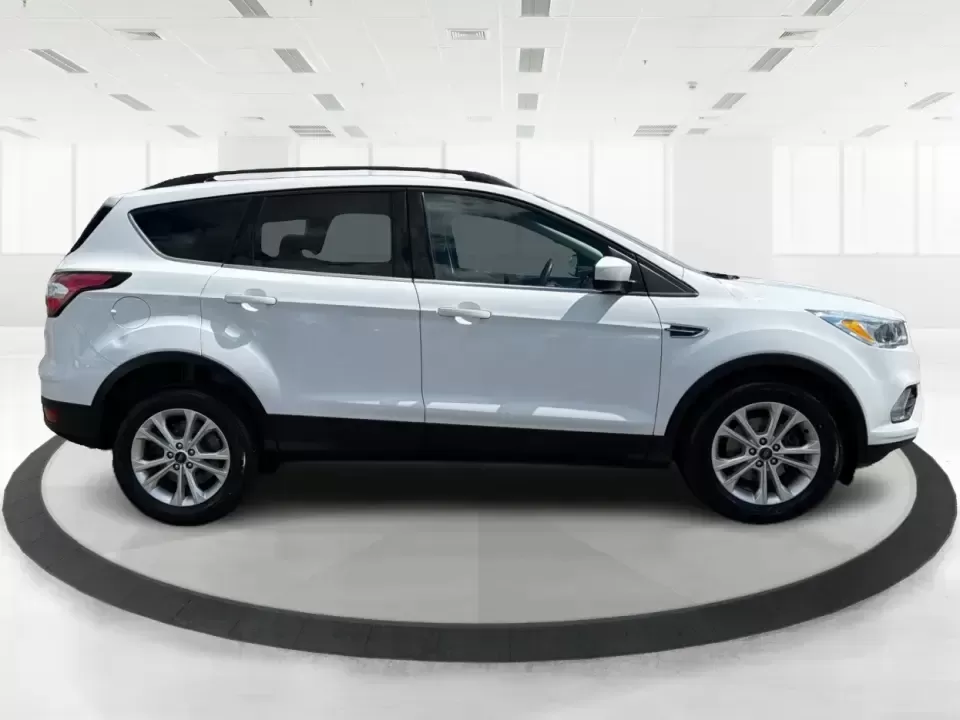 2018 Ford Escape SE (1FMCU0GD2JU) with an 1.5L L4 DOHC 16V engine, 6A transmission, located at 1951 S Dayton Lakeview Rd., New Carlisle, OH, 45344, (937) 908-9800, 39.890999, -84.050255 - Picture your next easy-to-live-with SUV: something that handles weekday commutes down I70, last-minute grocery runs near Brandt Pike, and weekend getaways to Buck Creek State Park without draining your budget. This 2018 Ford Escape SE is built for real life in Clark County-comfortable, efficient, an - Photo#1