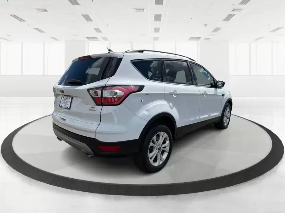 2018 Ford Escape SE (1FMCU0GD2JU) with an 1.5L L4 DOHC 16V engine, 6A transmission, located at 1951 S Dayton Lakeview Rd., New Carlisle, OH, 45344, (937) 908-9800, 39.890999, -84.050255 - Picture your next easy-to-live-with SUV: something that handles weekday commutes down I70, last-minute grocery runs near Brandt Pike, and weekend getaways to Buck Creek State Park without draining your budget. This 2018 Ford Escape SE is built for real life in Clark County-comfortable, efficient, an - Photo#2