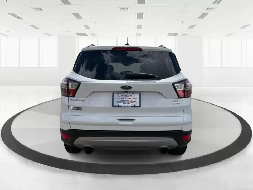 2018 Ford Escape SE (1FMCU0GD2JU) with an 1.5L L4 DOHC 16V engine, 6A transmission, located at 1951 S Dayton Lakeview Rd., New Carlisle, OH, 45344, (937) 908-9800, 39.890999, -84.050255 - Picture your next easy-to-live-with SUV: something that handles weekday commutes down I70, last-minute grocery runs near Brandt Pike, and weekend getaways to Buck Creek State Park without draining your budget. This 2018 Ford Escape SE is built for real life in Clark County-comfortable, efficient, an - Photo#3