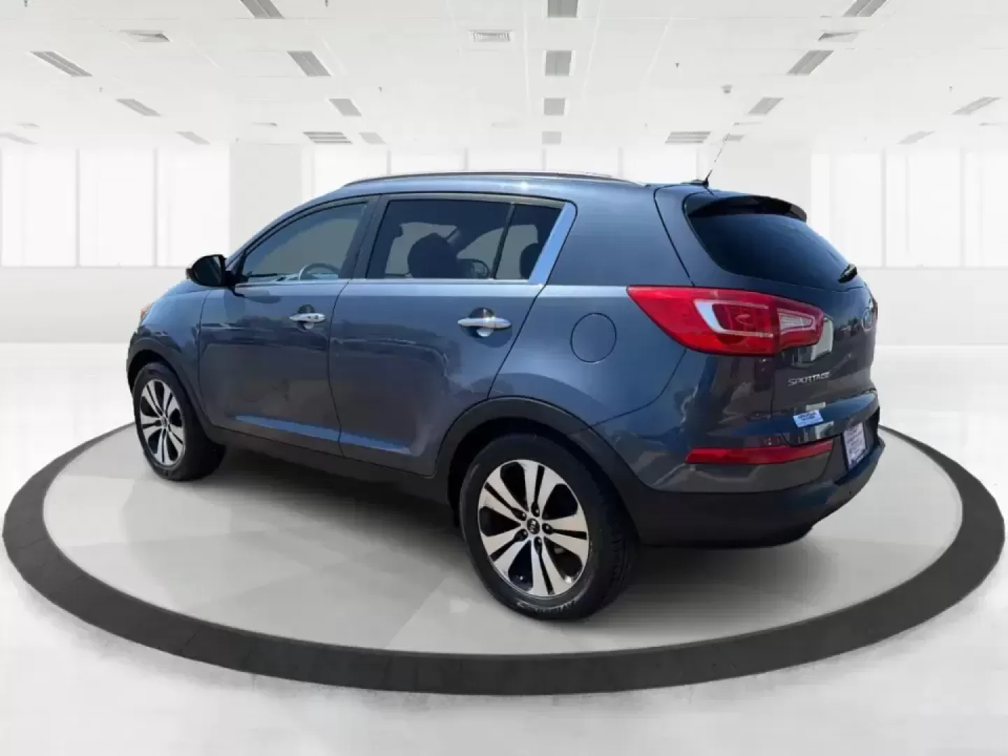 2012 Kia Sportage EX (KNDPC3A28C7) with an 2.4L I-4 DOHC engine, 6-Speed Automatic transmission, located at 880 E. National Road, Vandalia, OH, 45377, (937) 908-9800, 39.891918, -84.183594 - Picture your next week done right: an easy commute down I75, quick school drop-offs, a grocery run in the rain, and a spontaneous weekend trip to Taylorsville MetroPark-all in a compact SUV that feels comfortable, confident, and practical. This 2012 Kia Sportage EX in Twilight Blue is a smart fit fo - Photo#4